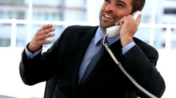 stock-footage-businessman-talking-on-the-phone-in-an-office